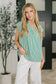 Like a Song Sleeveless V-Neck Blouse in Green