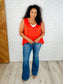 V-Neck Ruffled Peplum in Spicy Orange